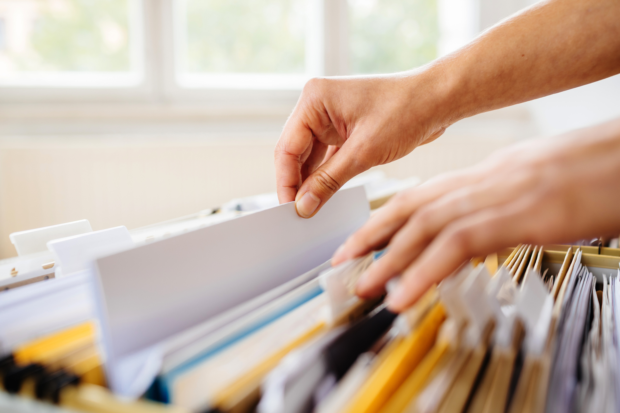 file in filing cabinet